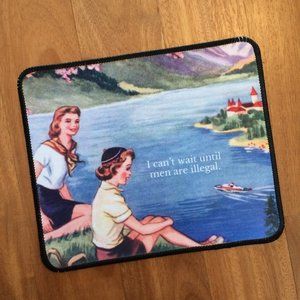 Snarky vintage-style feminist mousepad